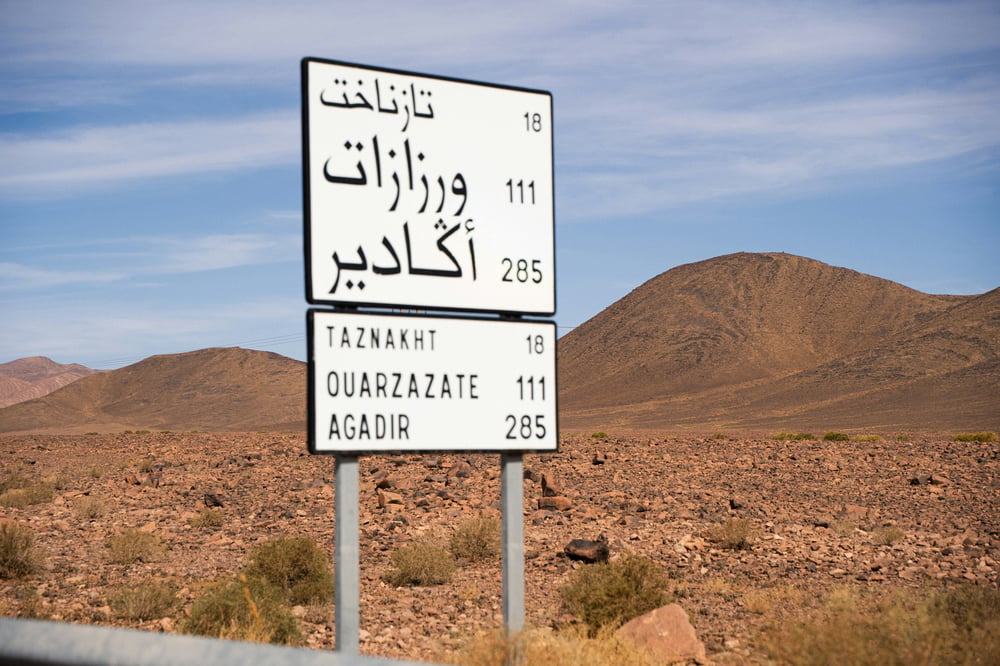 Roadsign in Arabic and English in Morocco