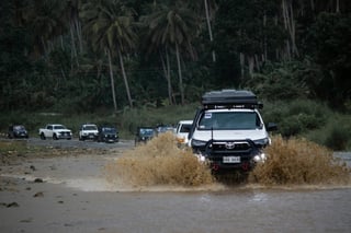 Cars in floated street in the Phillipines