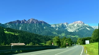 Sunny green road in Austria