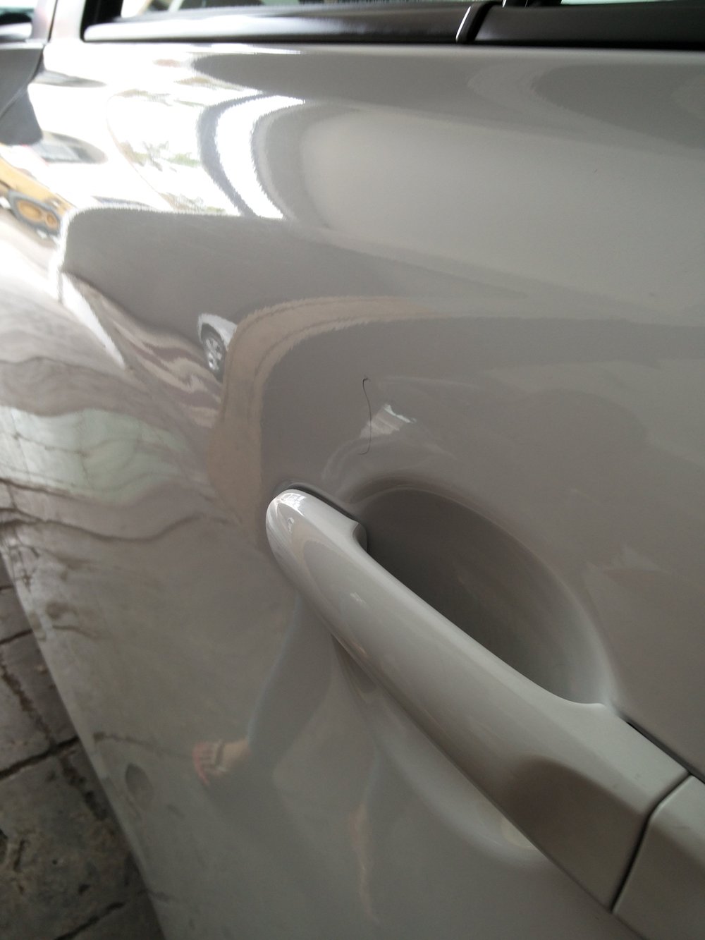 Check your car for scratches and dents before you drive off
