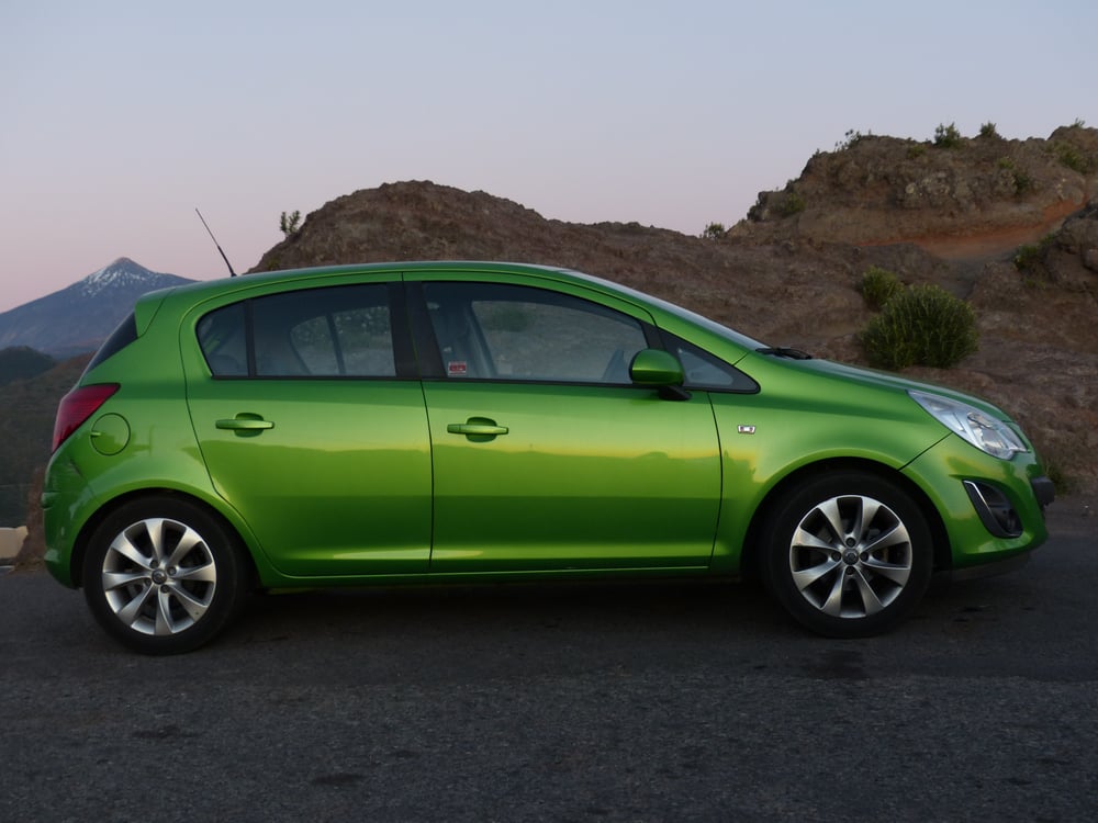 Green car as an example of a rental car for young drivers