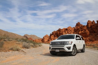 SUV on desert road