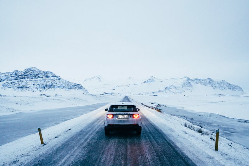White 4x4 in snowy landscape in Iceland