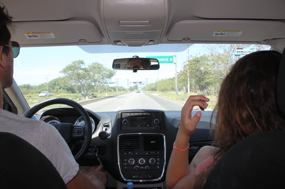 Young people renting a car in Mexico