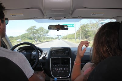 Young people renting a car in Mexico