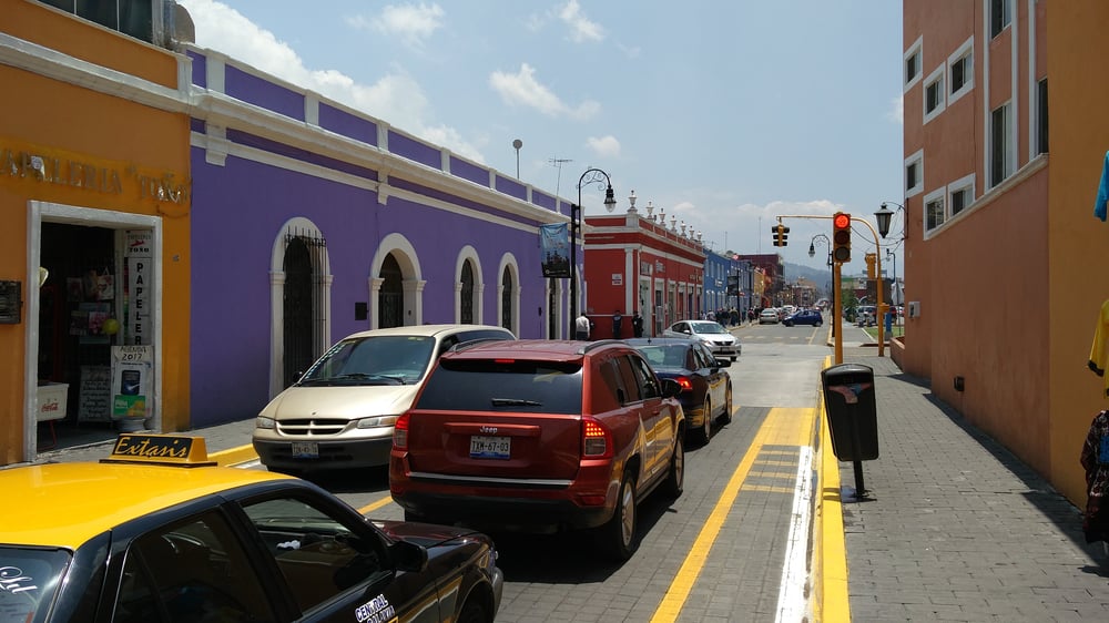 Cars in a street in Pueblo, Mexico
