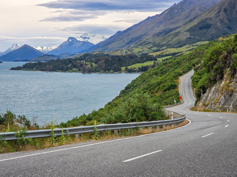 Road to Queenstown with mountains and lake