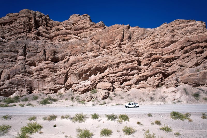 Rockformations with a white car in front, Argentina